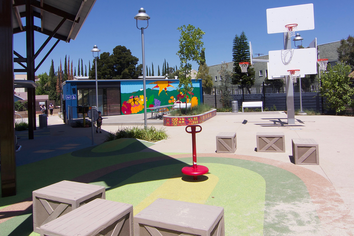 multiple heights basketball hoops and sand play area