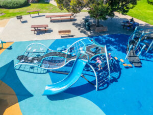 SkyWays Independent and Integrated Shades providing cover over the playground.